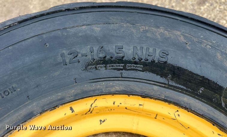 image for item MP9193 (4) 12-16.5 NHS foam filled skid steer tires and wheels