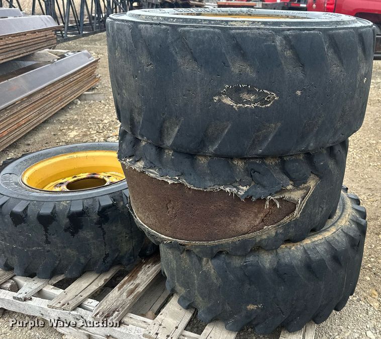 image for item MP9193 (4) 12-16.5 NHS foam filled skid steer tires and wheels