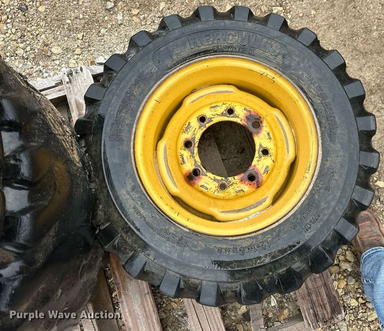 image for item MP9193 (4) 12-16.5 NHS foam filled skid steer tires and wheels
