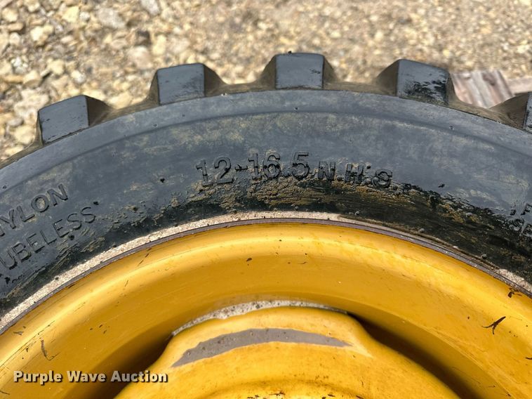 image for item MP9193 (4) 12-16.5 NHS foam filled skid steer tires and wheels