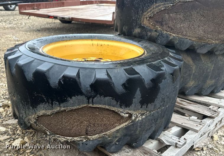 image for item MP9193 (4) 12-16.5 NHS foam filled skid steer tires and wheels