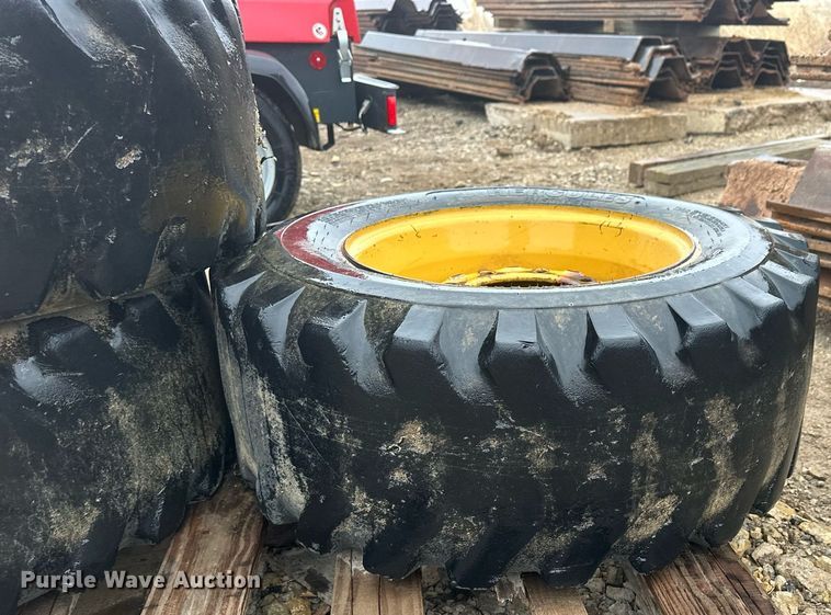image for item MP9193 (4) 12-16.5 NHS foam filled skid steer tires and wheels