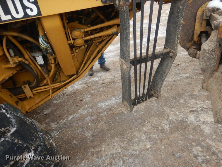 image for item DJ7005 2005 Caterpillar 140H  motor grader