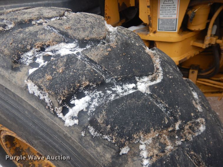 image for item DJ7005 2005 Caterpillar 140H  motor grader