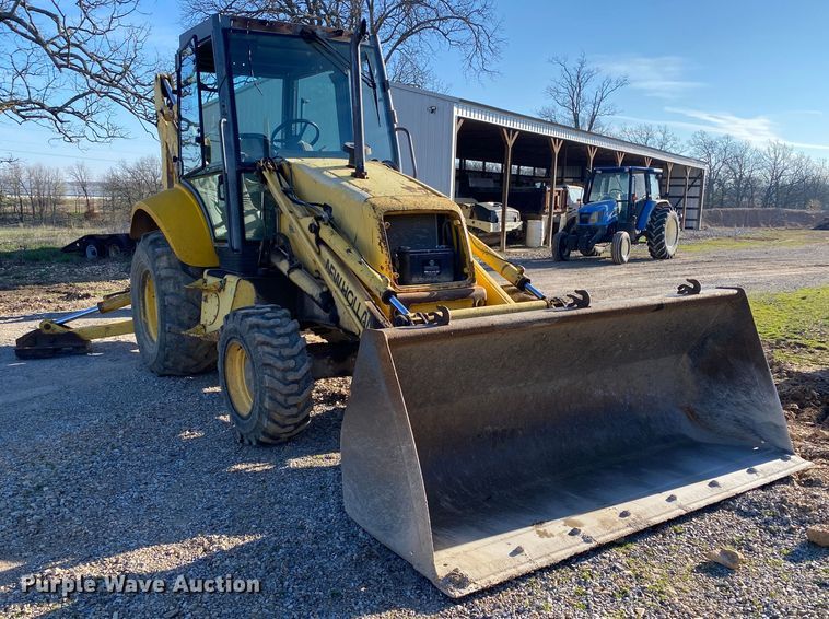 image for item DL7076 1999 New Holland 555E  backhoe