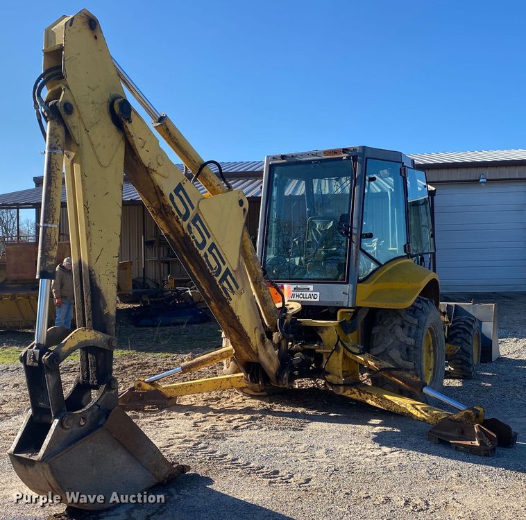 image for item DL7076 1999 New Holland 555E  backhoe