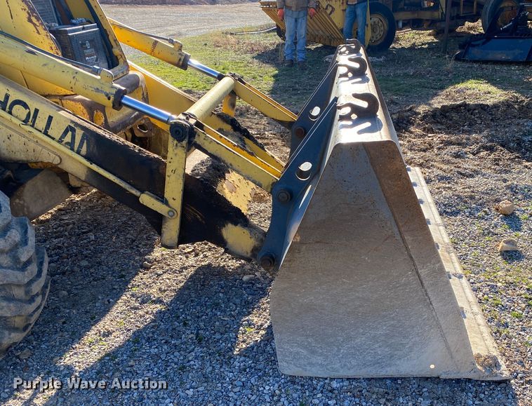 image for item DL7076 1999 New Holland 555E  backhoe