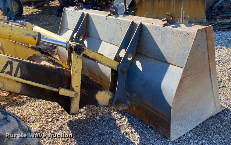 image for item DL7076 1999 New Holland 555E  backhoe