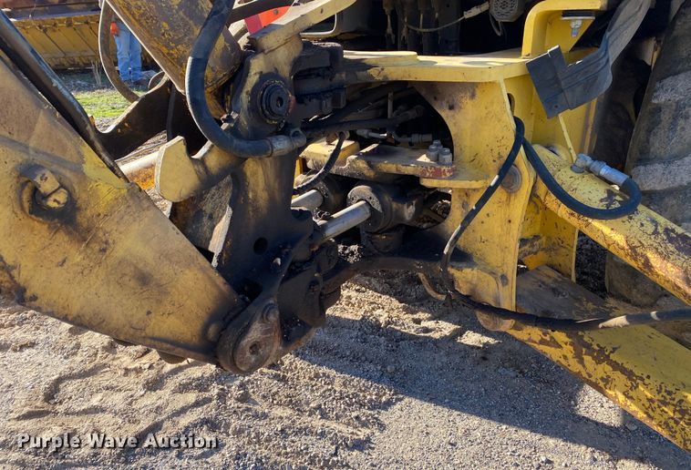 image for item DL7076 1999 New Holland 555E  backhoe