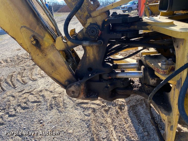 image for item DL7076 1999 New Holland 555E  backhoe
