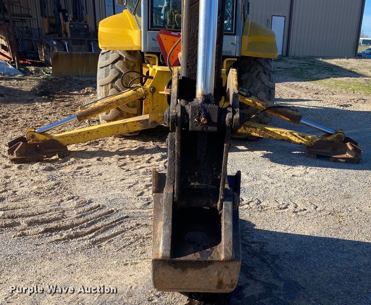 image for item DL7076 1999 New Holland 555E  backhoe