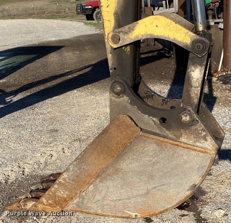 image for item DL7076 1999 New Holland 555E  backhoe