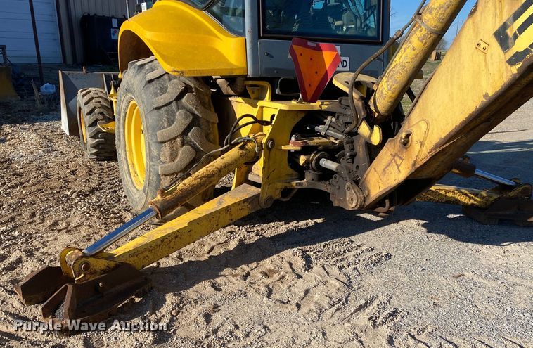image for item DL7076 1999 New Holland 555E  backhoe