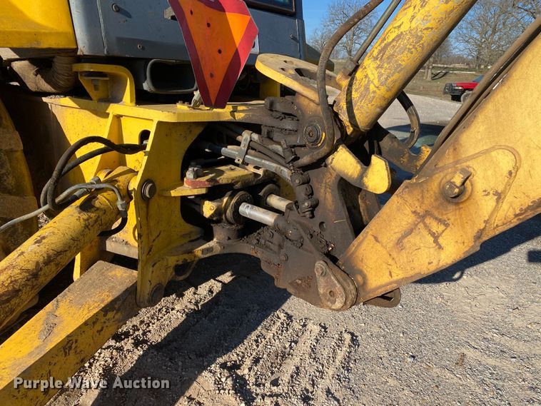 image for item DL7076 1999 New Holland 555E  backhoe