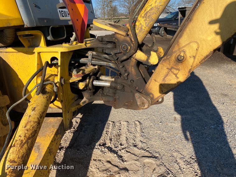 image for item DL7076 1999 New Holland 555E  backhoe