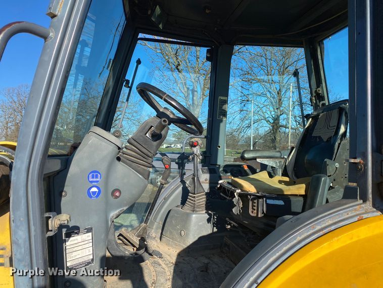 image for item DL7076 1999 New Holland 555E  backhoe