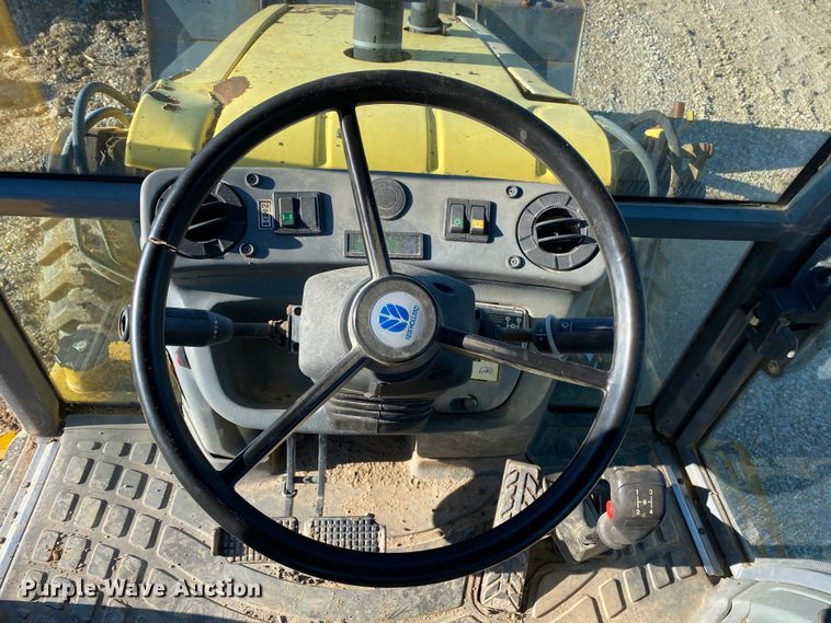 image for item DL7076 1999 New Holland 555E  backhoe
