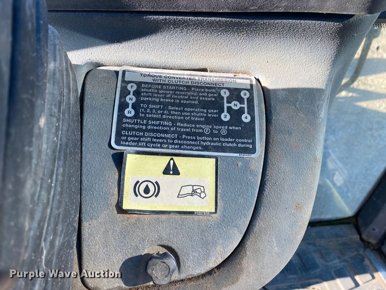 image for item DL7076 1999 New Holland 555E  backhoe