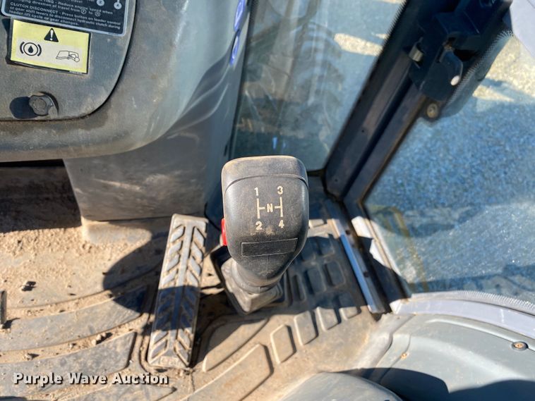 image for item DL7076 1999 New Holland 555E  backhoe