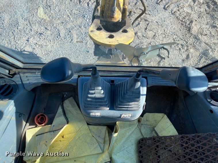 image for item DL7076 1999 New Holland 555E  backhoe