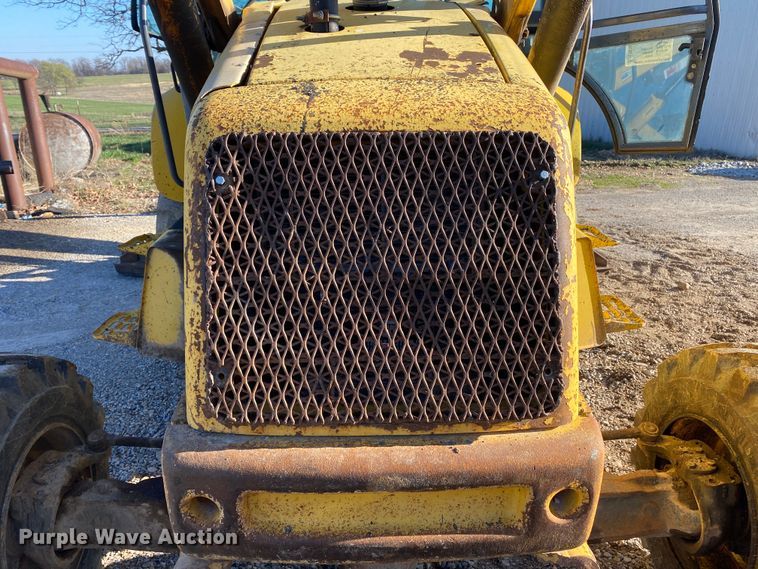 image for item DL7076 1999 New Holland 555E  backhoe