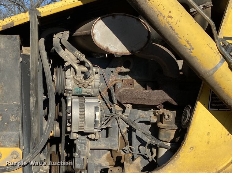 image for item DL7076 1999 New Holland 555E  backhoe