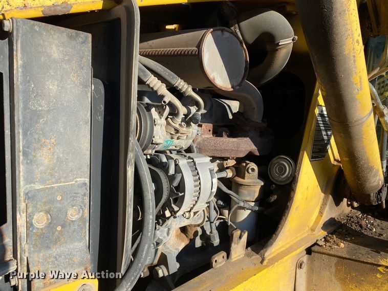 image for item DL7076 1999 New Holland 555E  backhoe