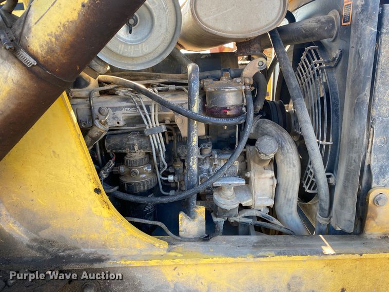 image for item DL7076 1999 New Holland 555E  backhoe