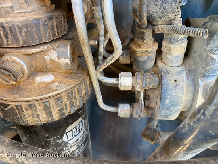 image for item DL7076 1999 New Holland 555E  backhoe