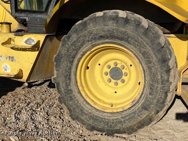 image for item DL7076 1999 New Holland 555E  backhoe