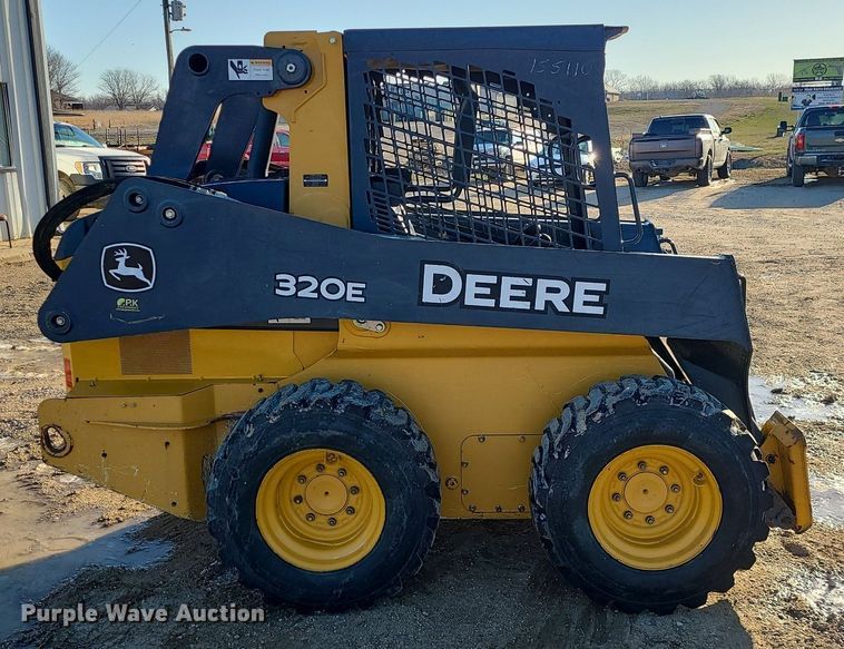 image for item LH9932 2014 John Deere 320E  skid steer loader