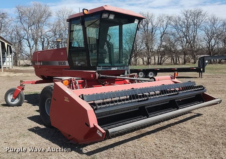 image for item DQ0352 1996 Case IH 8830  swather / windrower