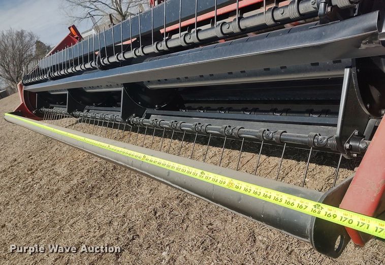 image for item DQ0352 1996 Case IH 8830  swather / windrower