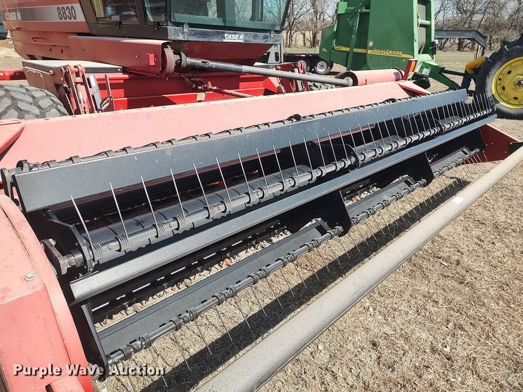 image for item DQ0352 1996 Case IH 8830  swather / windrower
