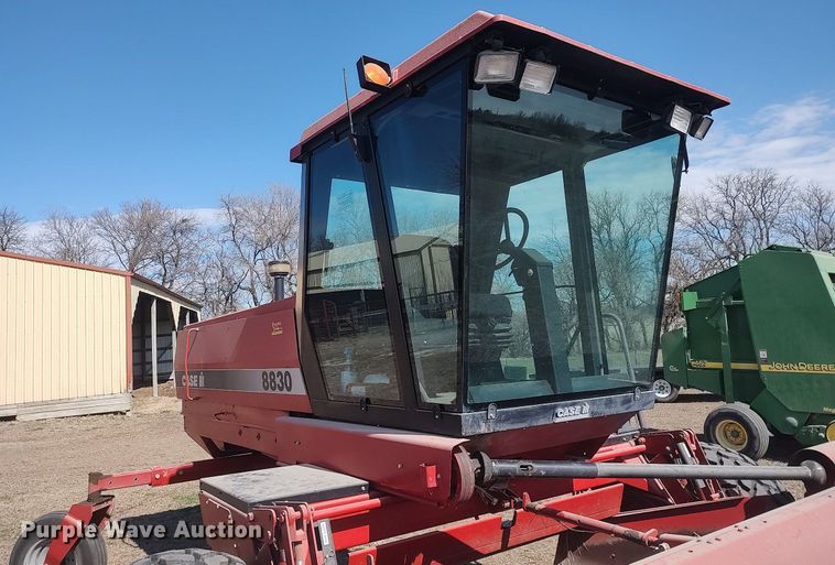 image for item DQ0352 1996 Case IH 8830  swather / windrower