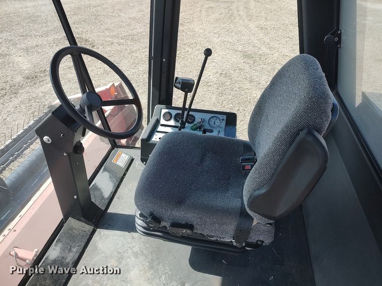 image for item DQ0352 1996 Case IH 8830  swather / windrower