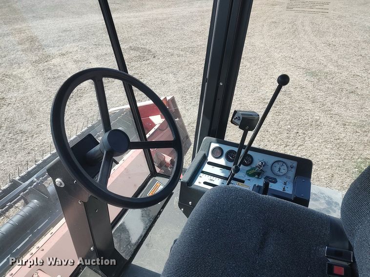 image for item DQ0352 1996 Case IH 8830  swather / windrower