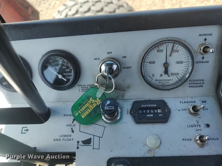 image for item DQ0352 1996 Case IH 8830  swather / windrower