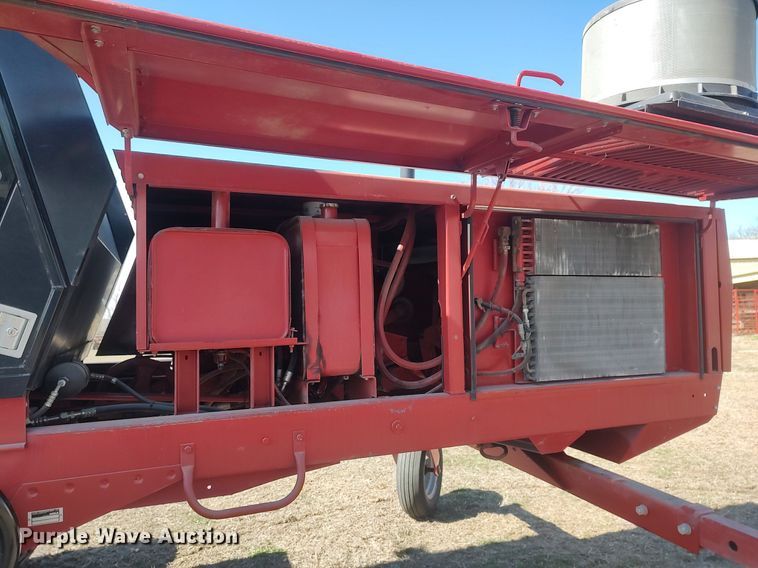 image for item DQ0352 1996 Case IH 8830  swather / windrower