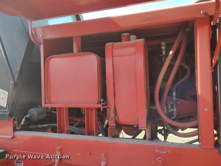 image for item DQ0352 1996 Case IH 8830  swather / windrower