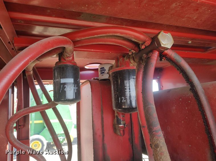 image for item DQ0352 1996 Case IH 8830  swather / windrower