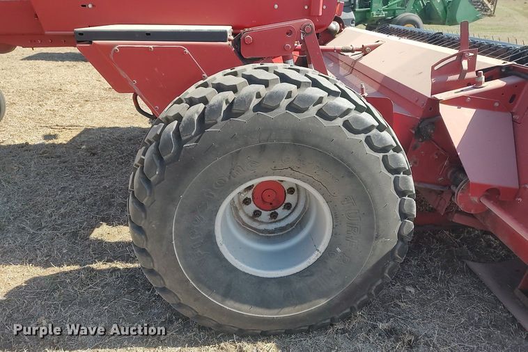 image for item DQ0352 1996 Case IH 8830  swather / windrower