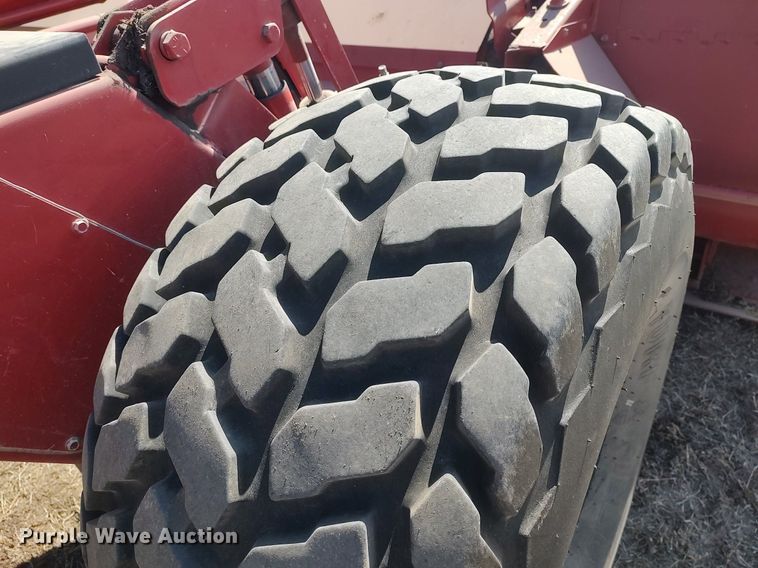 image for item DQ0352 1996 Case IH 8830  swather / windrower