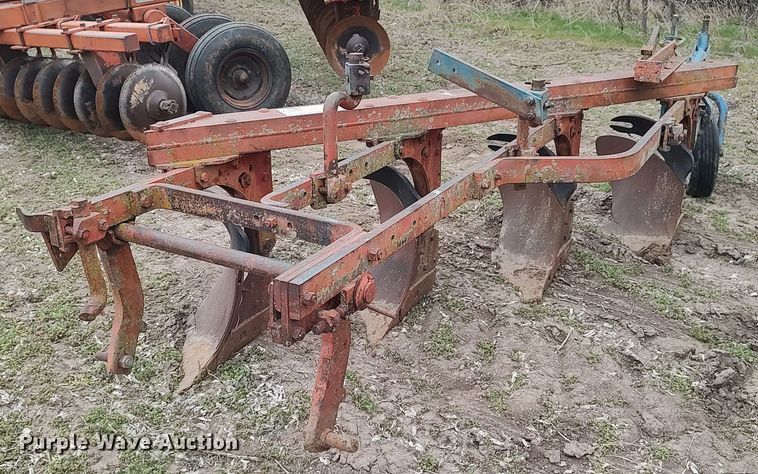 image for item DQ0375 McCormick  four bottom plow
