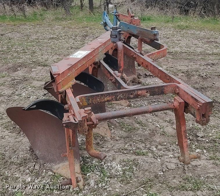 image for item DQ0375 McCormick  four bottom plow