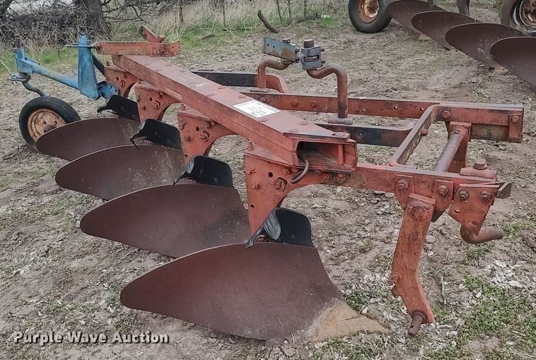 image for item DQ0375 McCormick  four bottom plow