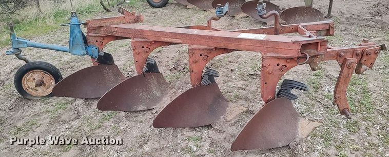 image for item DQ0375 McCormick  four bottom plow
