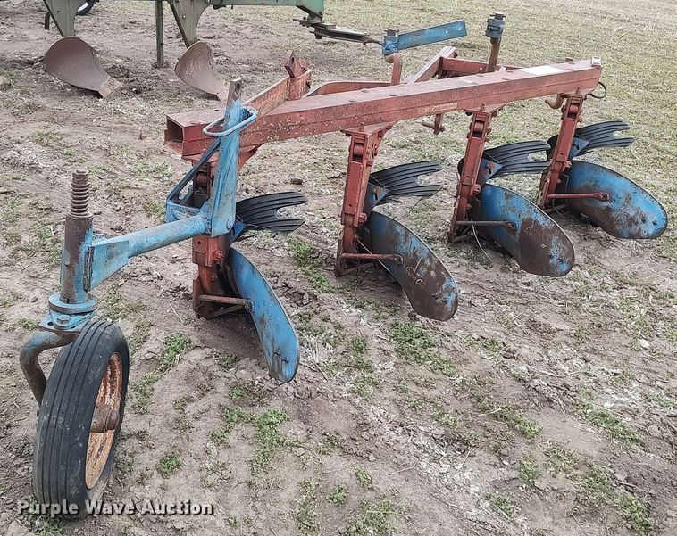 image for item DQ0375 McCormick  four bottom plow