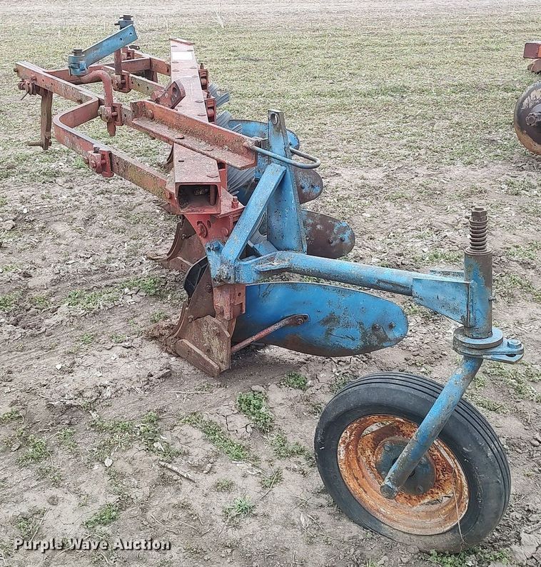 image for item DQ0375 McCormick  four bottom plow