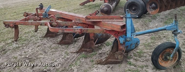 image for item DQ0375 McCormick  four bottom plow